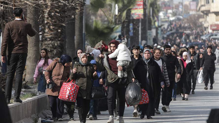 Syria tells civilians to leave Aleppo's Kurdish areas