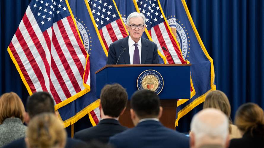 US Fed holds interest rates steady, defying Trump pressure