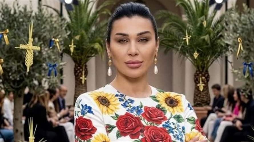 نادين الراسي ترتدي العلم اللبناني: "إنّ الثورة تولد من رحم الأحزان" (صورة)