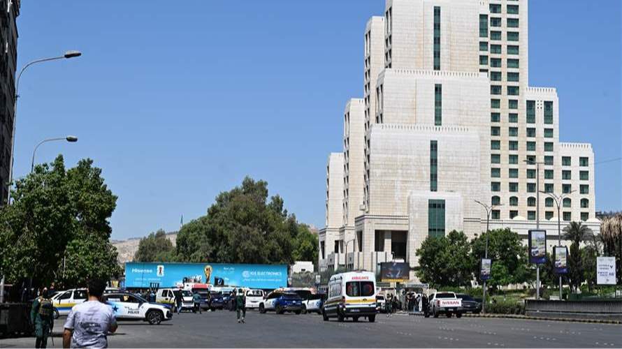 Syria says 18 wounded including four policemen in Damascus blasts