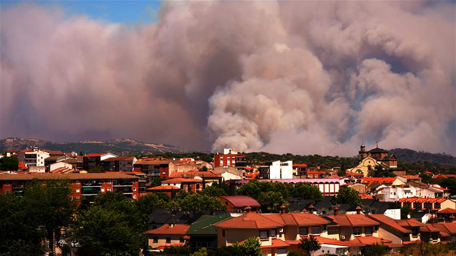 Spain to start first return of fire evacuees Monday near Madrid: Official