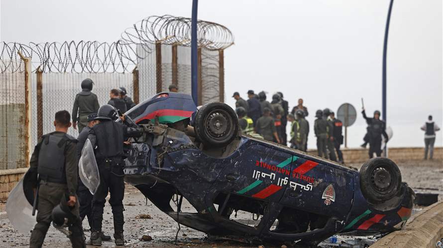 Spain boosts police deployment to Ceuta as migrant crisis swells