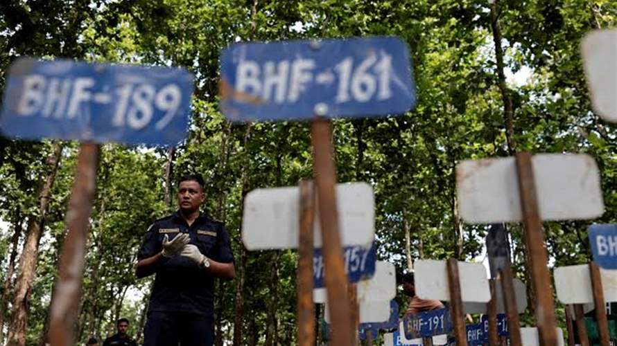 Nepal begins mass burials of unidentified flood victims as families seek missing