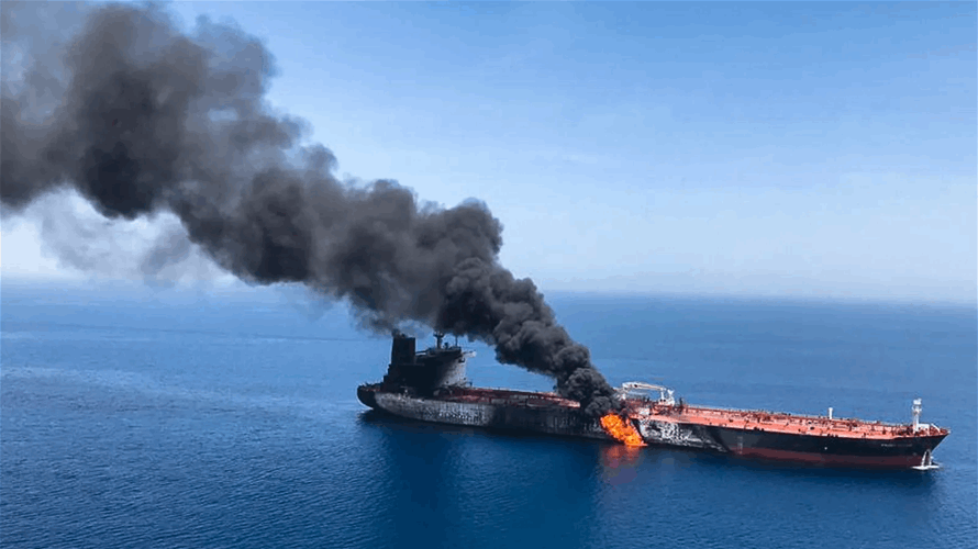 Iran says oil tanker caught fire near Hormuz after hitting mines