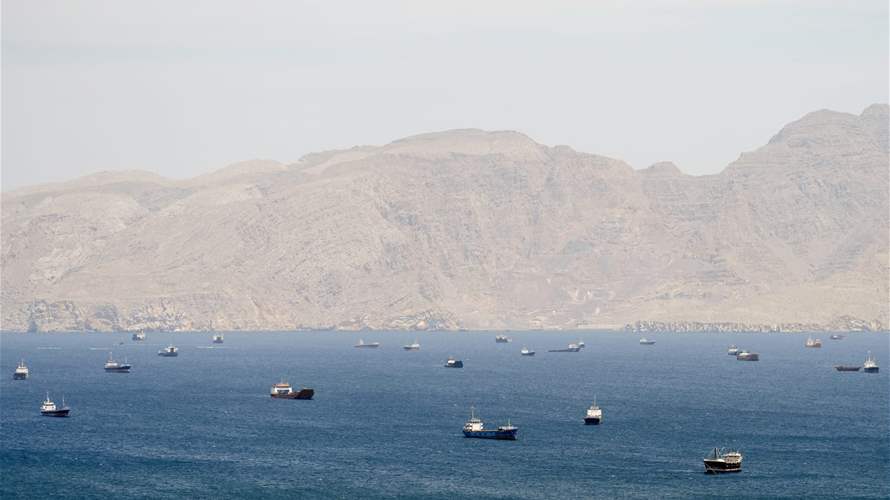 Iran Guards say two oil tankers on fire after hitting mines in Hormuz
