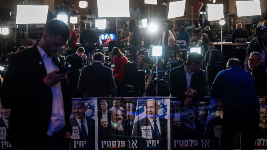 Israel FM says opposition celebrations 'premature' after exit polls show lead