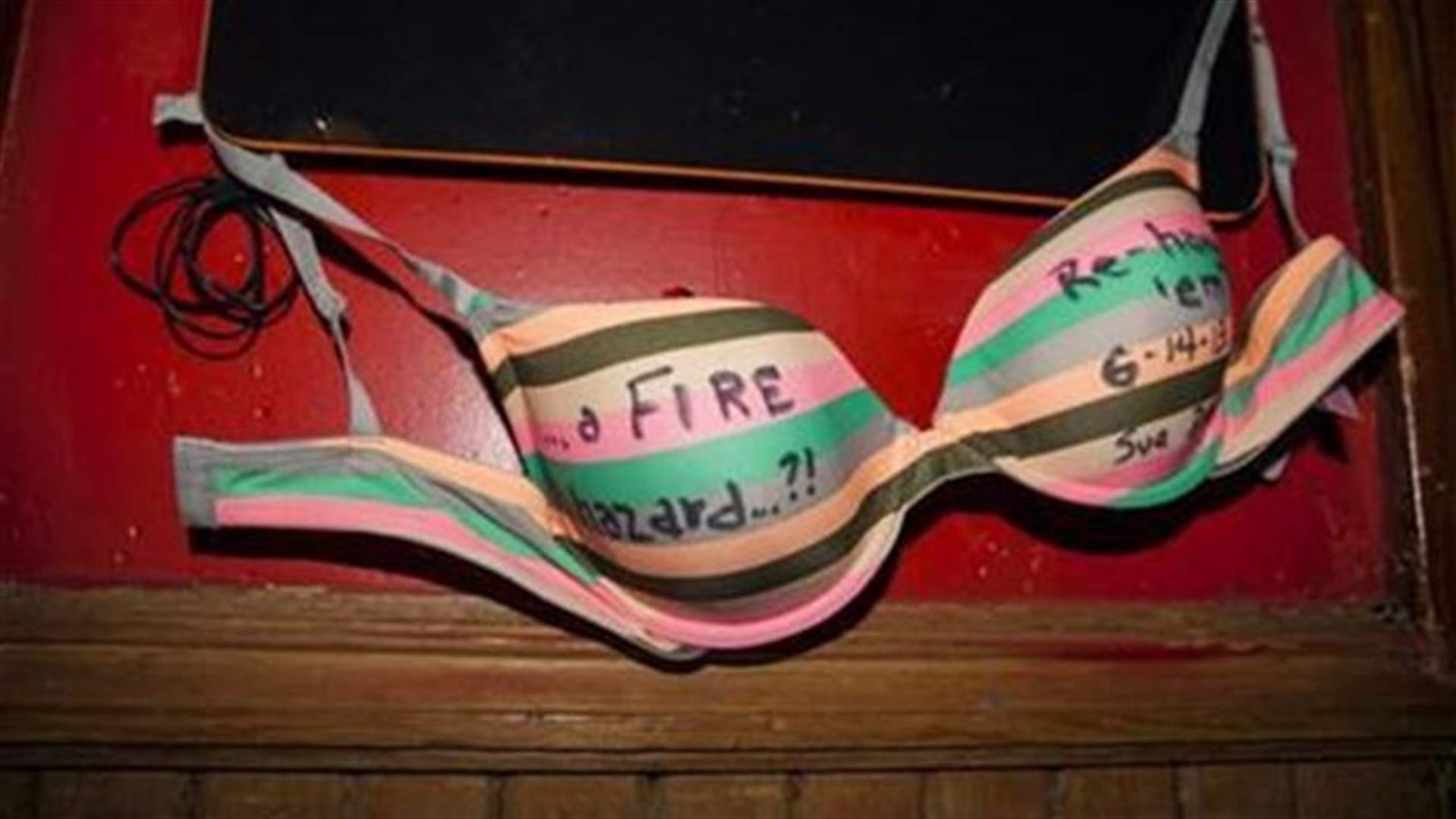 Tavern hosts -The Great Bra Rehanging- event