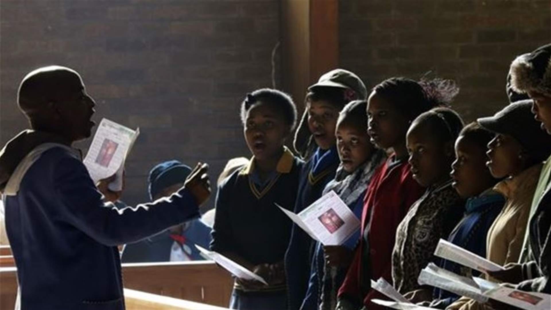 South Africa says Mandela condition improved overnight, still critical