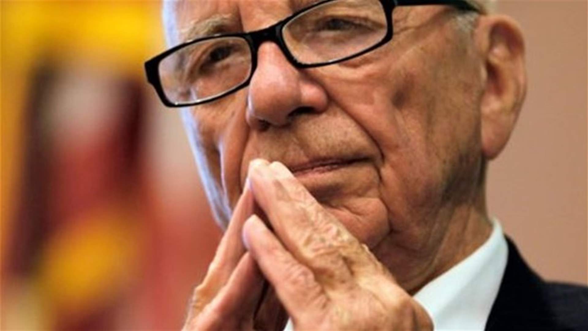 UK lawmakers recall Murdoch over phone-hacking evidence