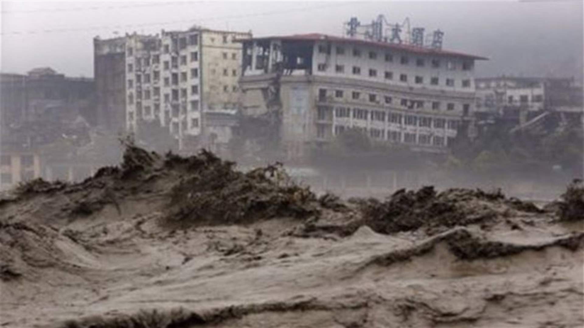 Mudslide in western China buries about 30