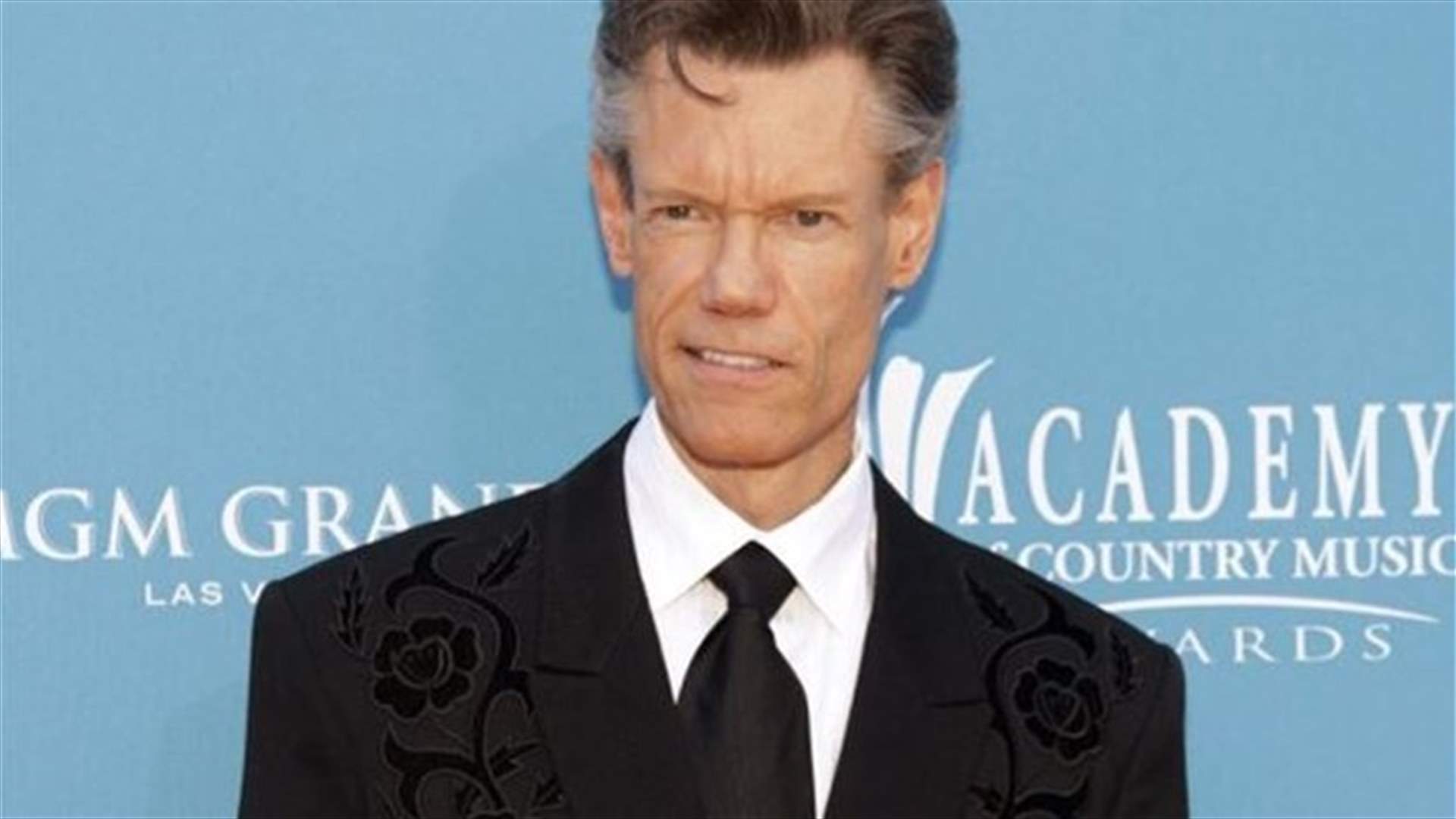 Singer Randy Travis sedated, remains critical