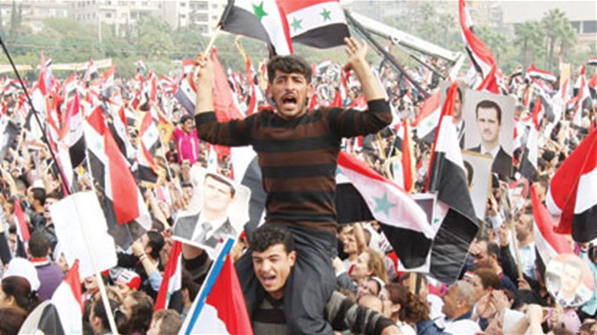 Pro Assad rally at US consulate in Quds