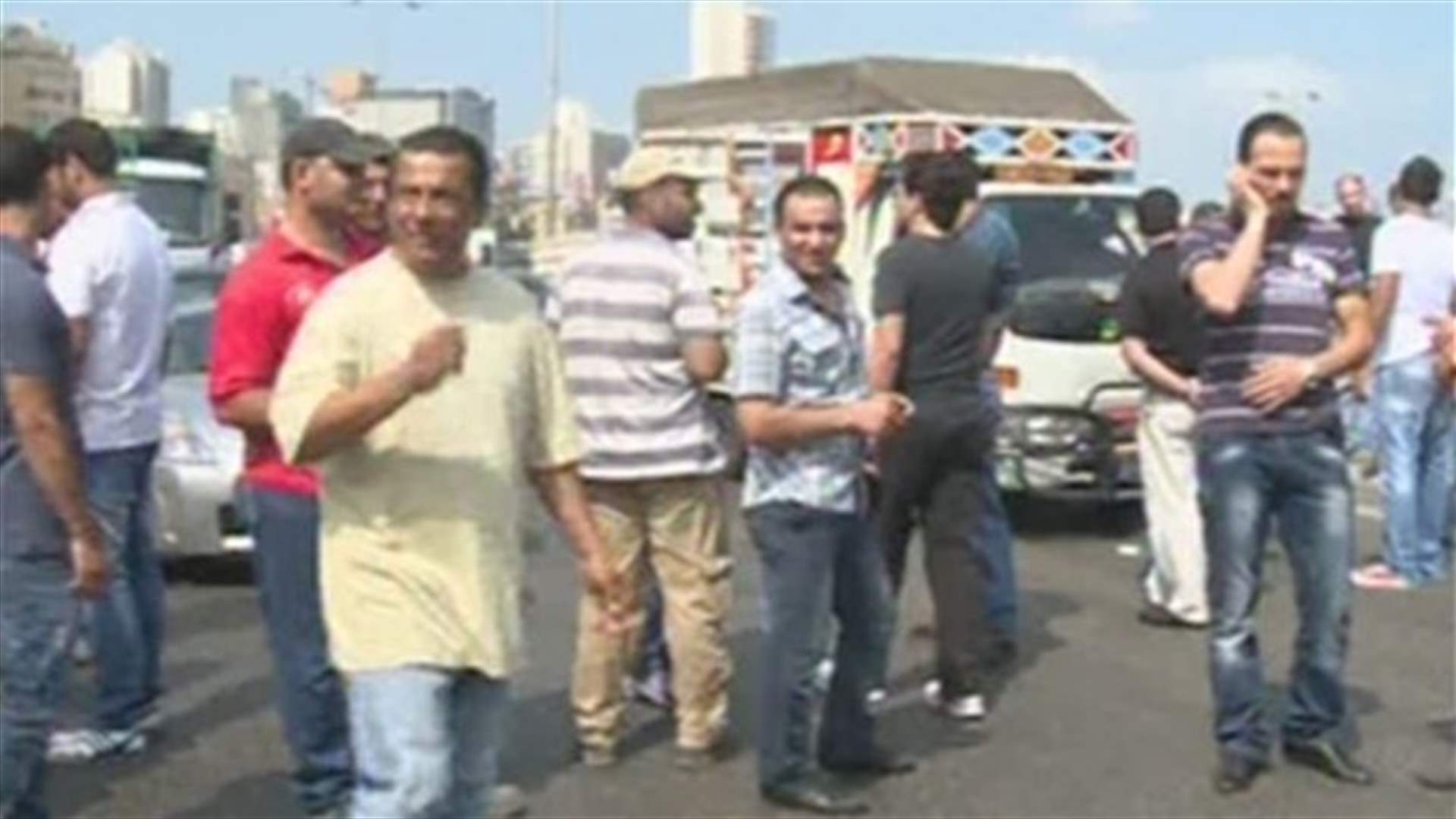 EDL contract workers burn tires, block EDL's entrance