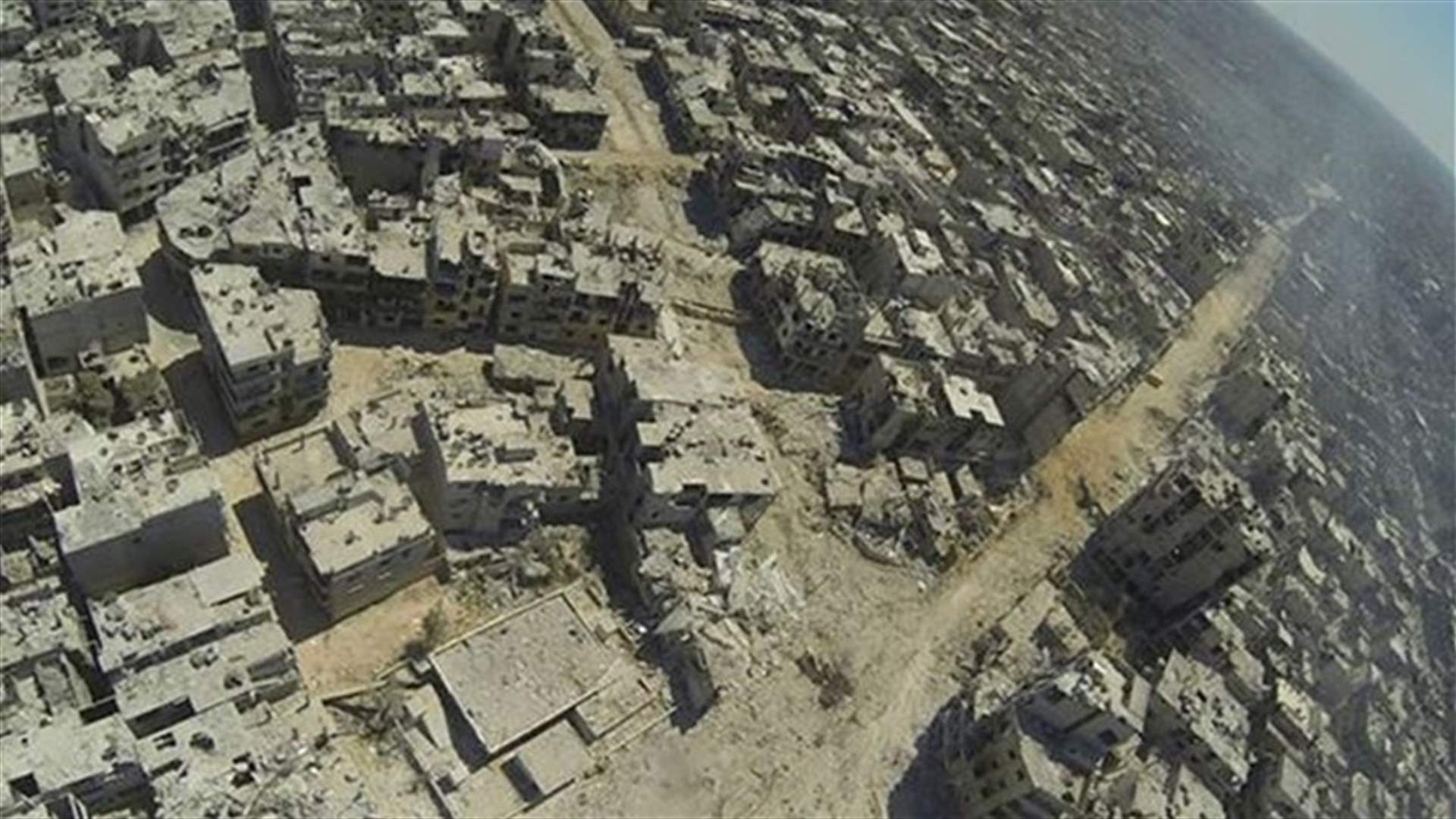 Syria says army retakes Homs district from rebels
