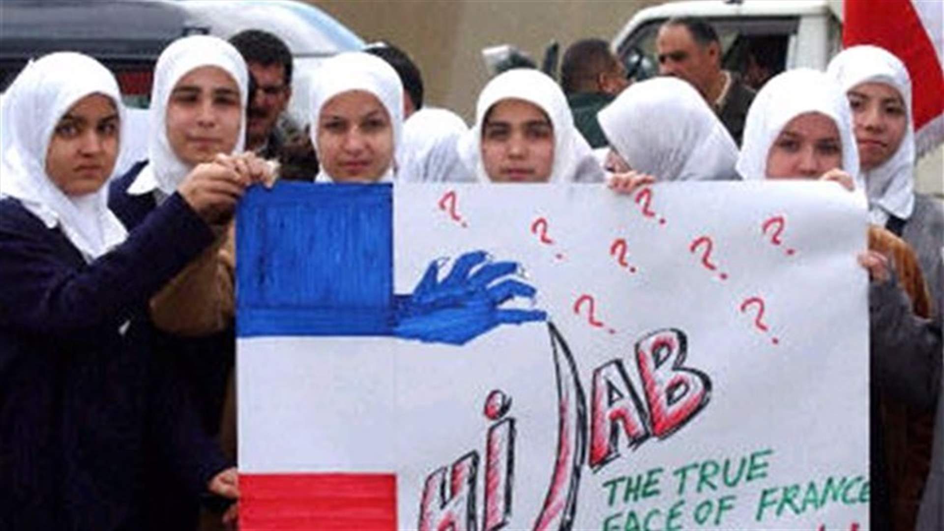 France considers extending veil ban to include universities