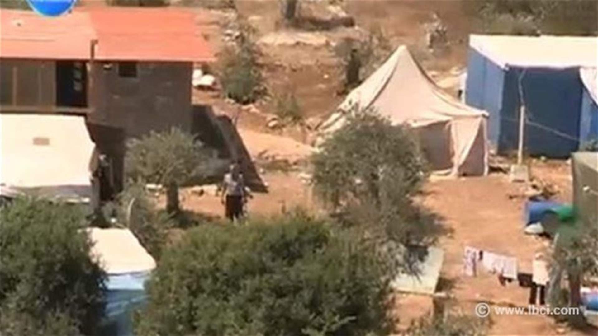REPORT: Refugees in Ketermaya celebrate Eid with snakes and insects