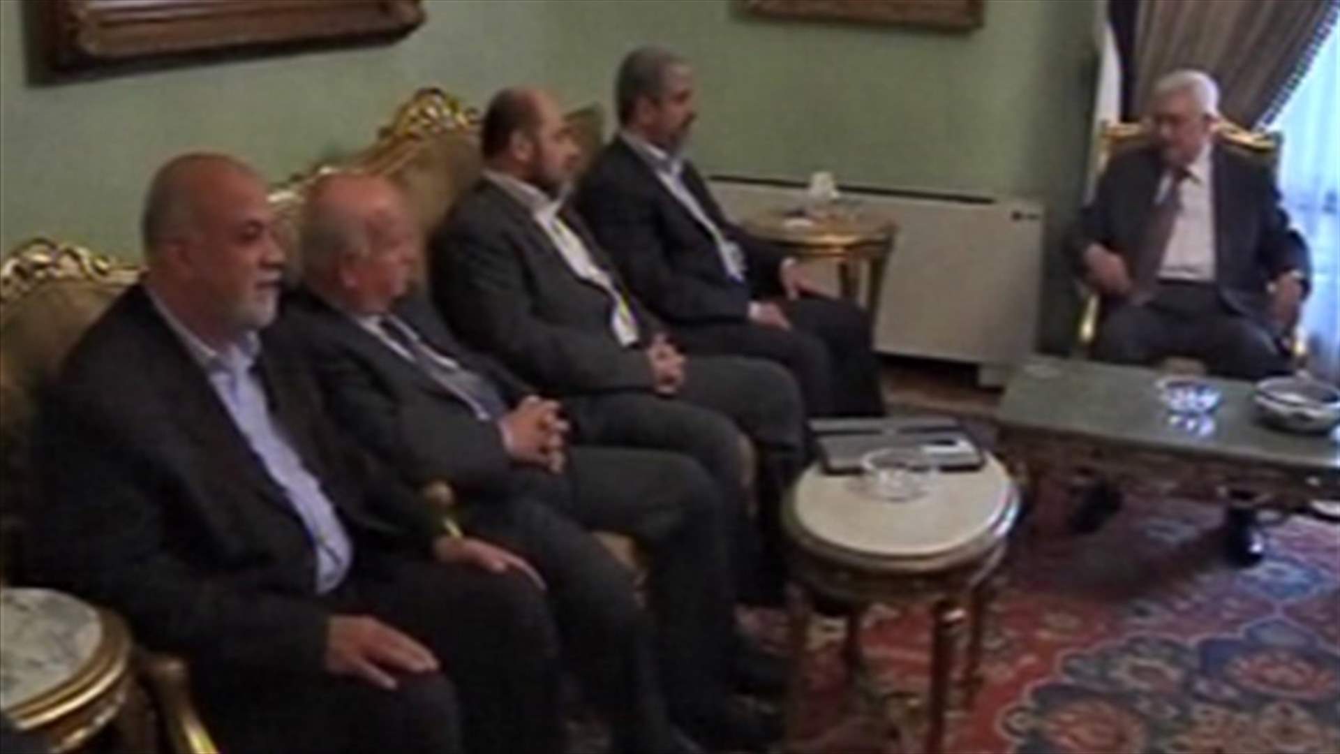 عباس ومشعل يعلنان بدء شراكة فلسطينية جديدة