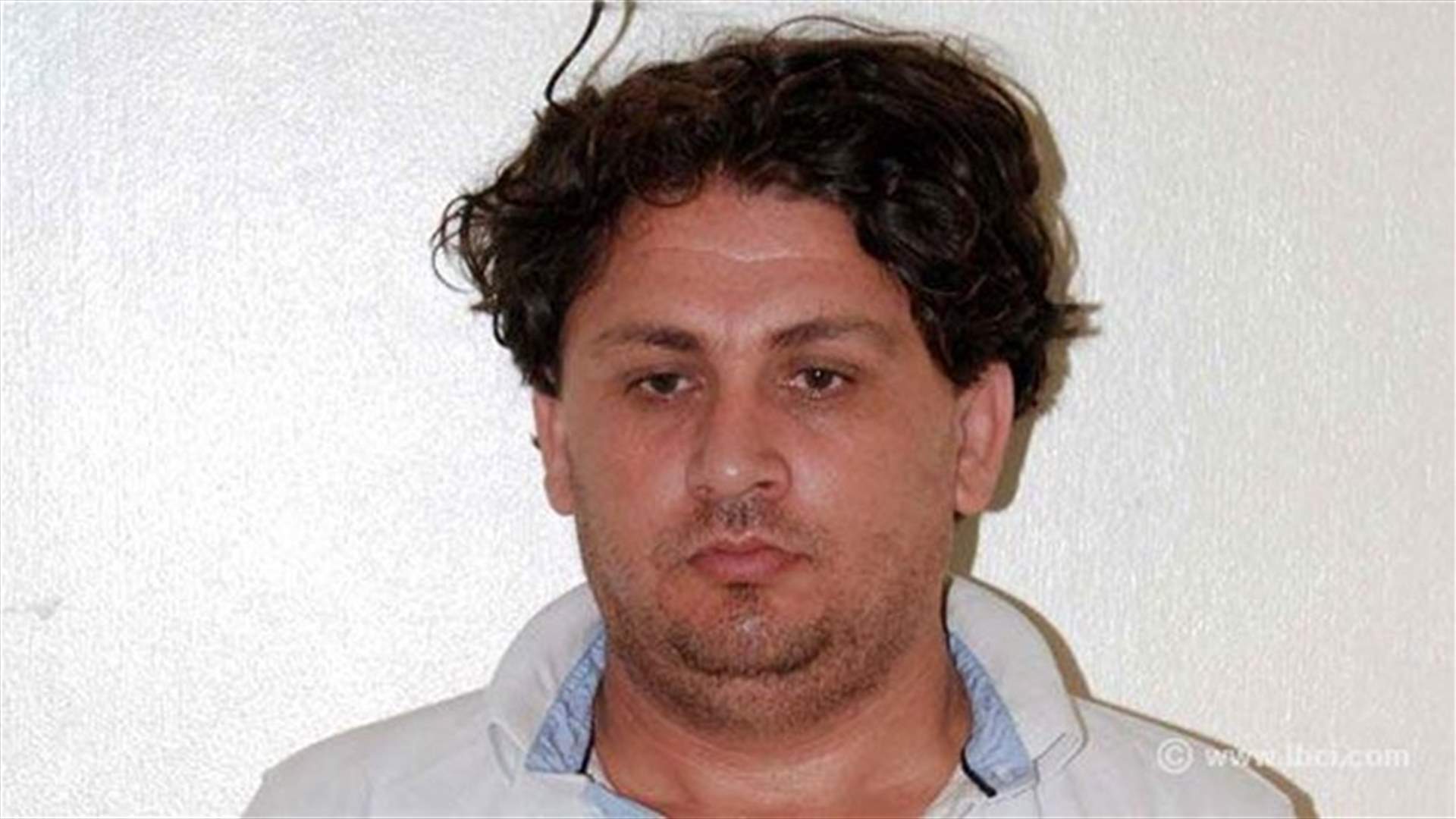 تعميم صورة موقوف بجرم السرقة عبر تزوير بطاقات ائتمان مصرفية