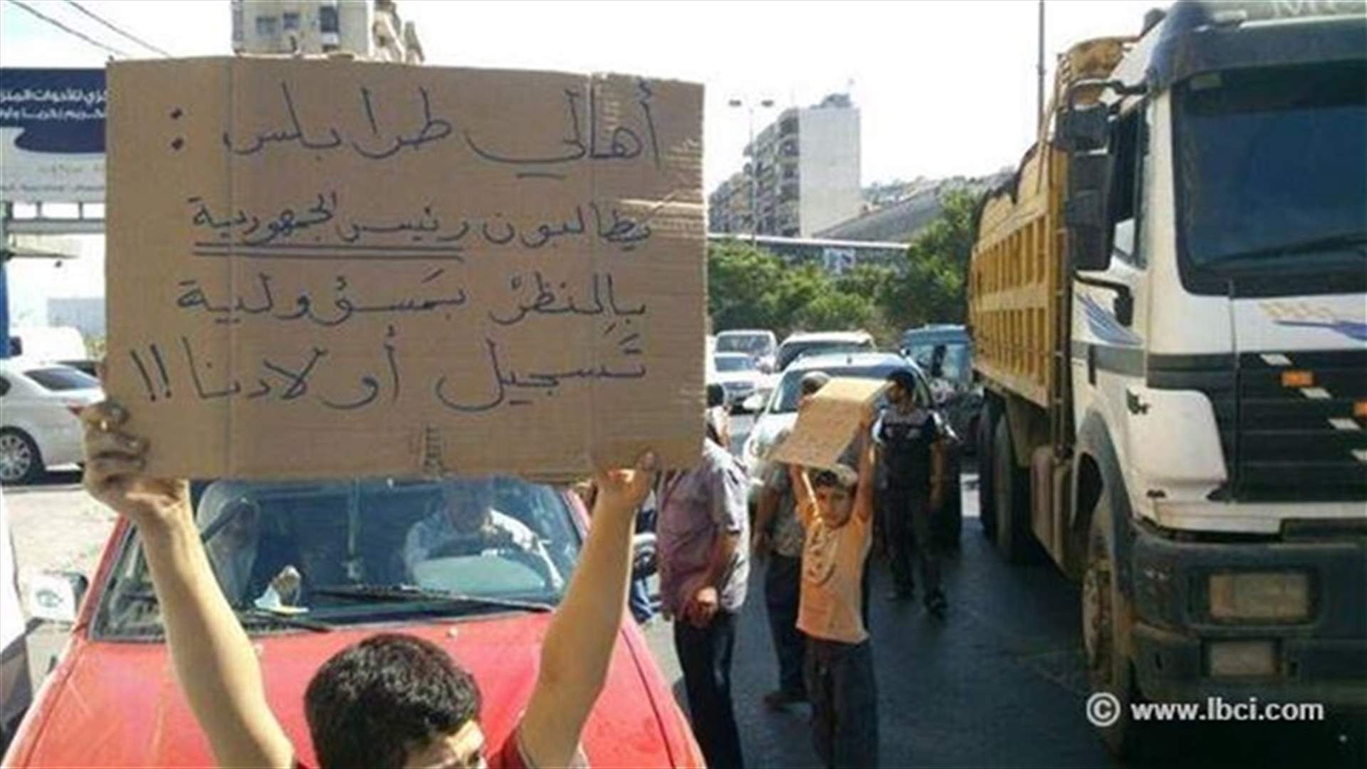 Two roads cut-off to protest rise in public schools registration fees