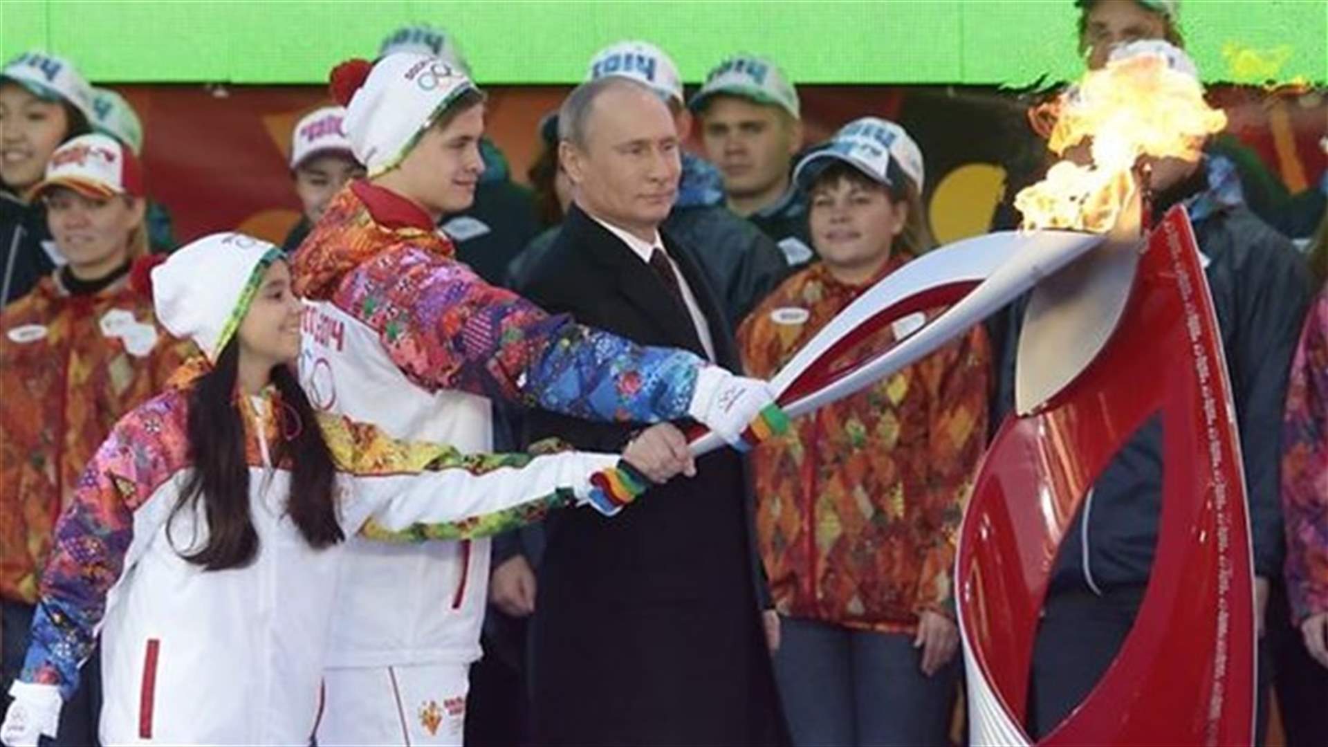 Putin lights Olympic flame for Sochi on Red Square