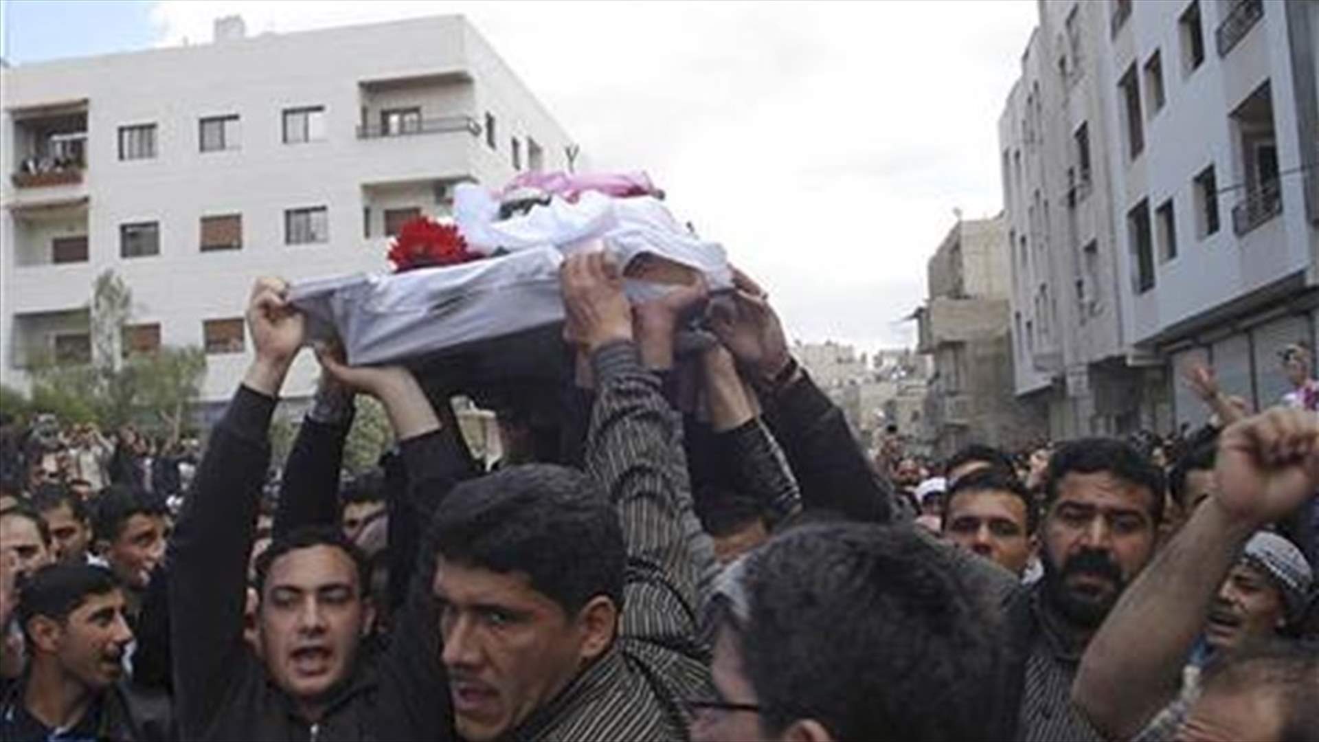 Secret police defect in restive Syrian province