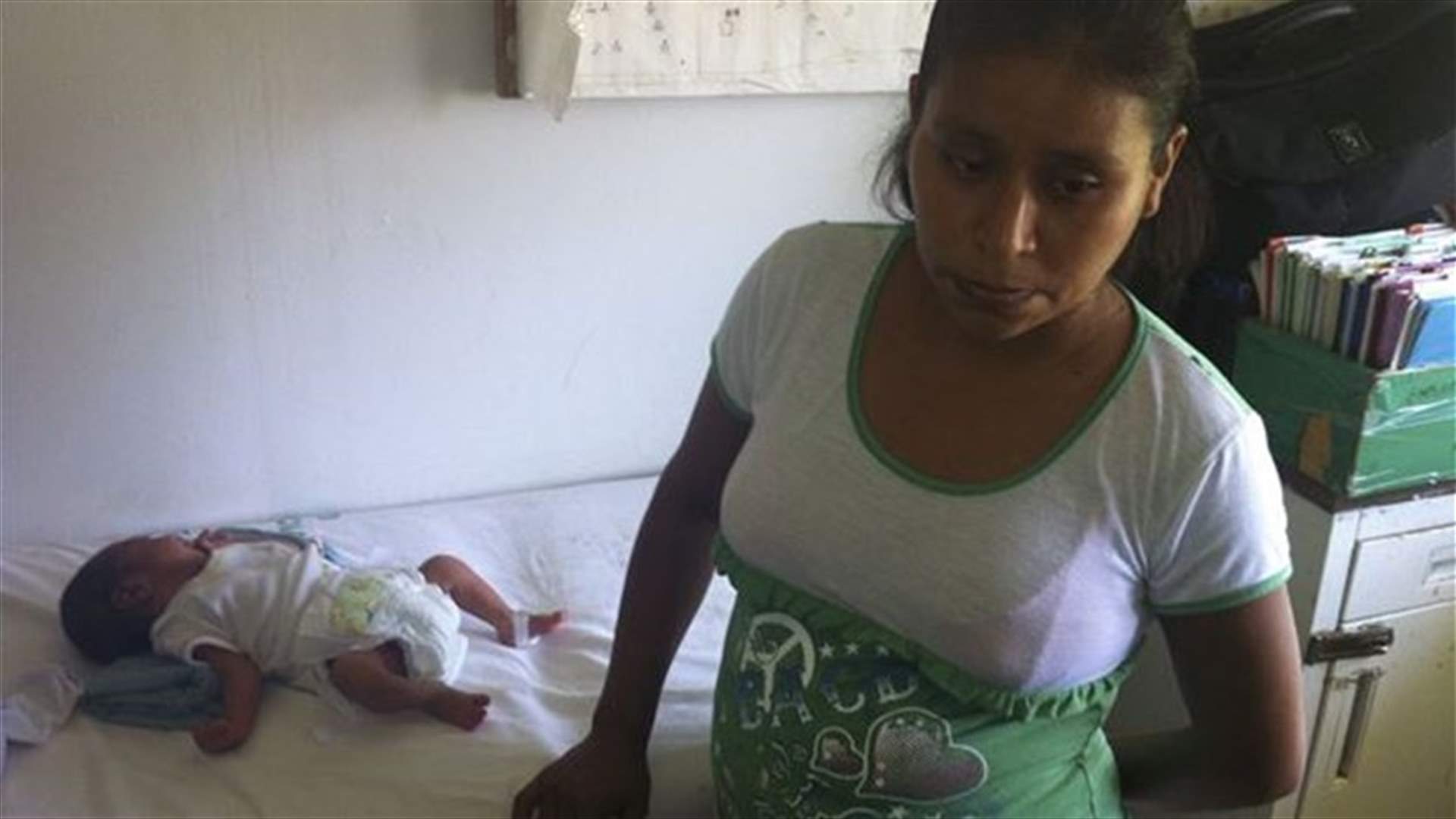 Woman denied help gives birth on clinic's lawn