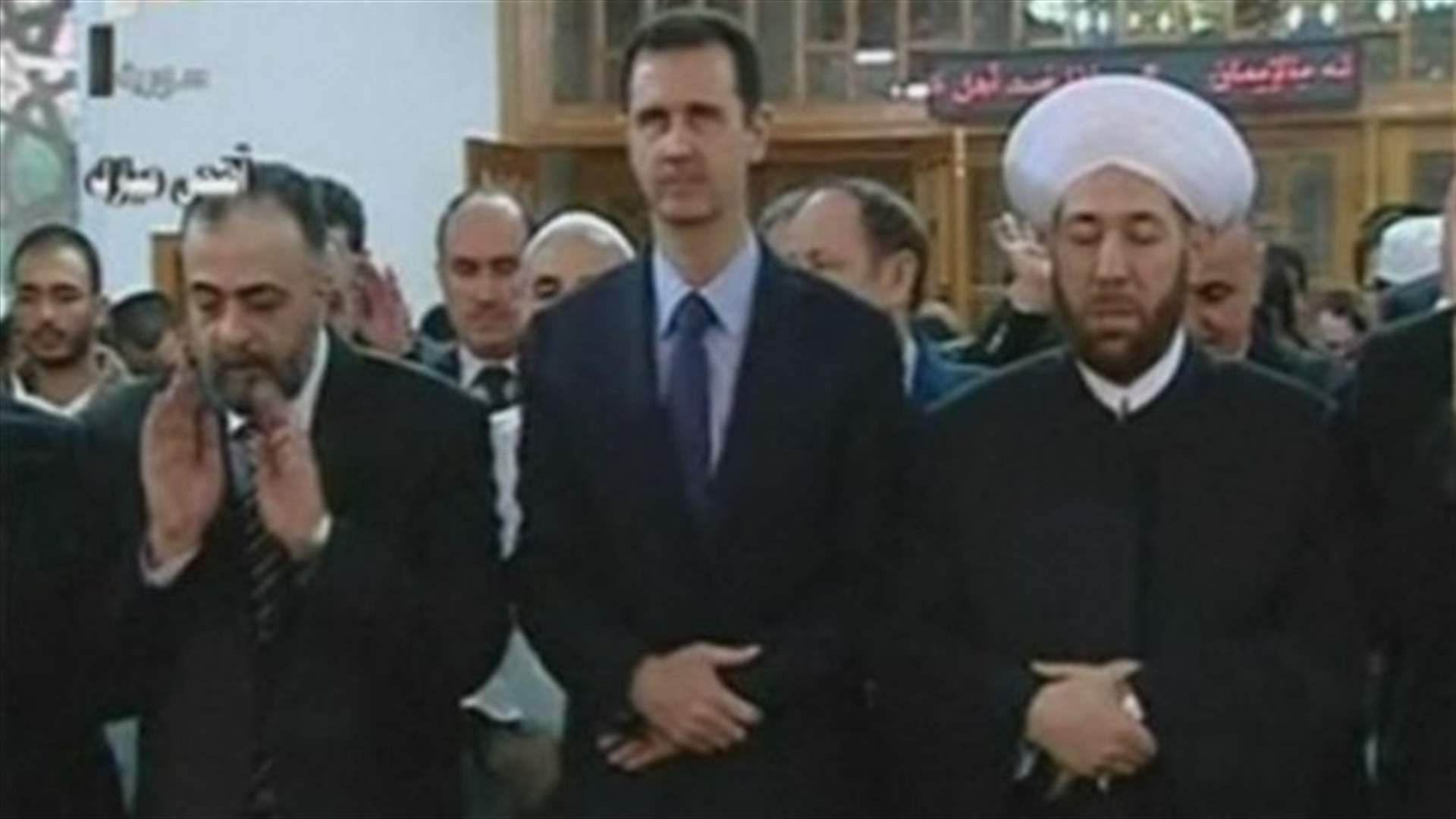 Syrian TV shows President Assad attending Eid prayers