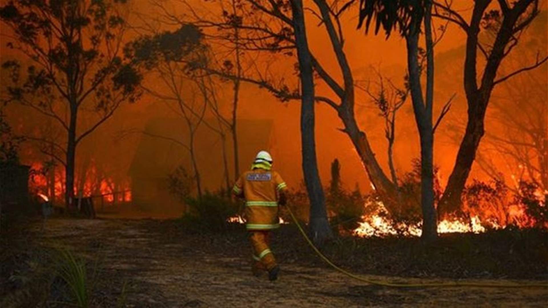 Exhausted firefighters keep up battle against flames in Australia 