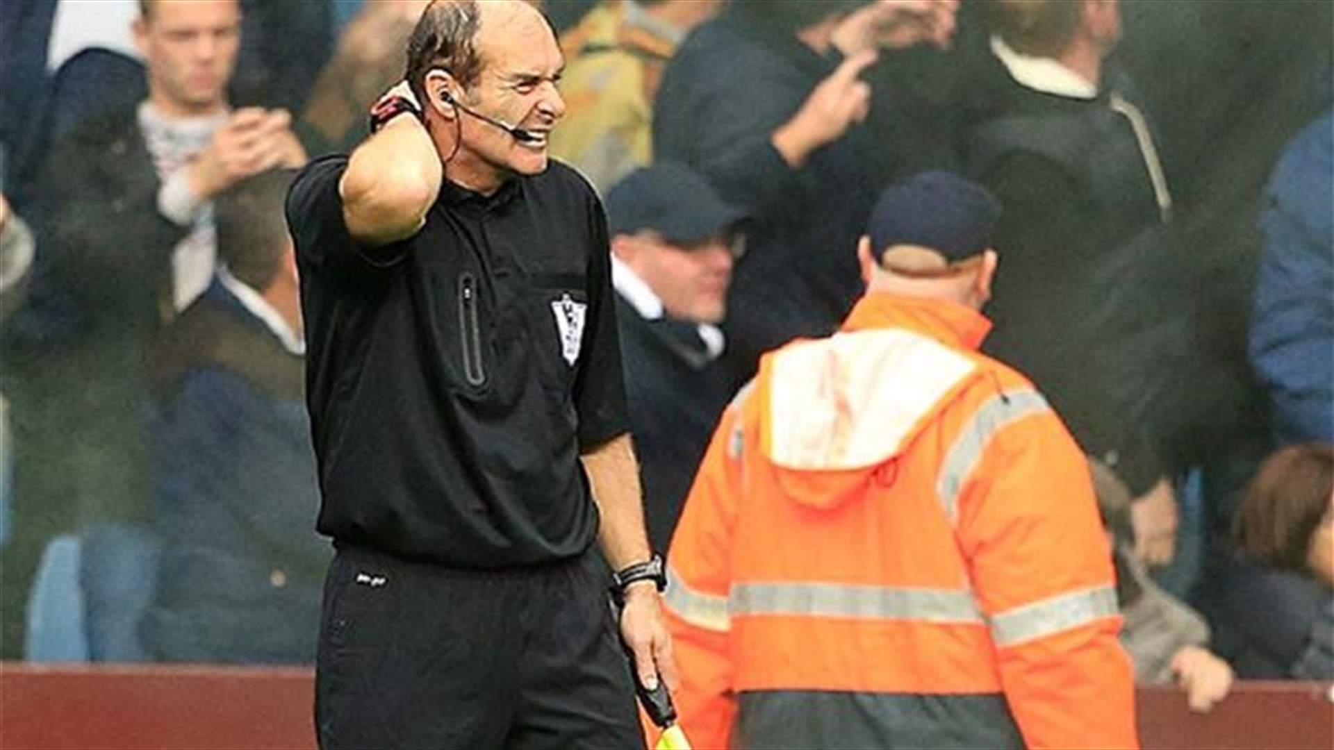 VIDEO: Assistant referee hit by flare during Aston Villa v Tottenham Hotspur game