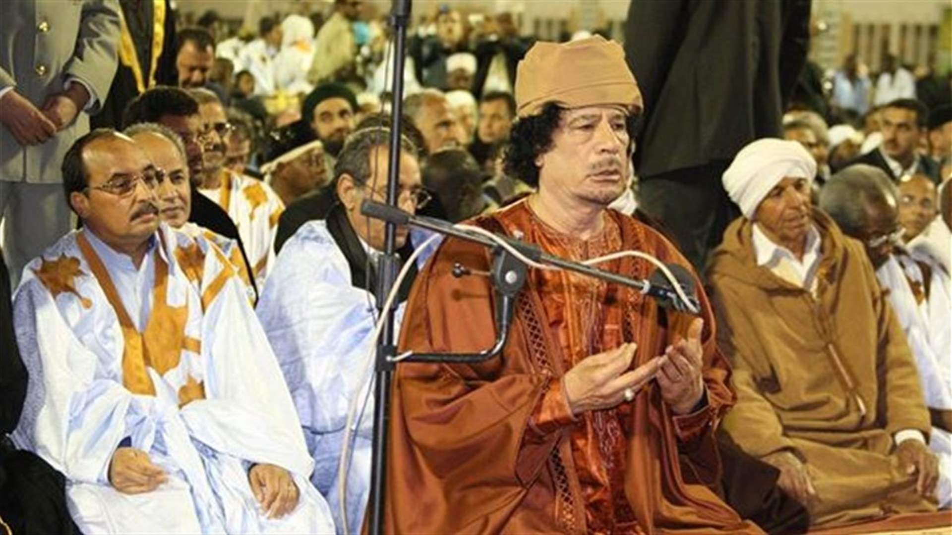 ارملة القذافي تطالب بجثمانه