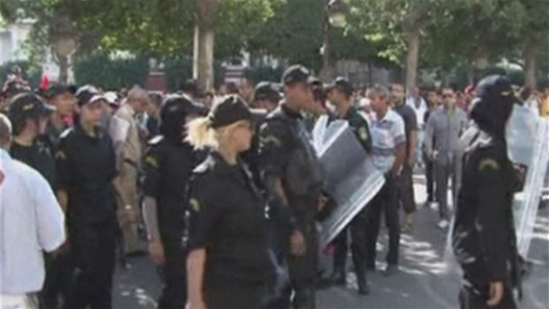 6 Tunisian police killed; protests hit capital