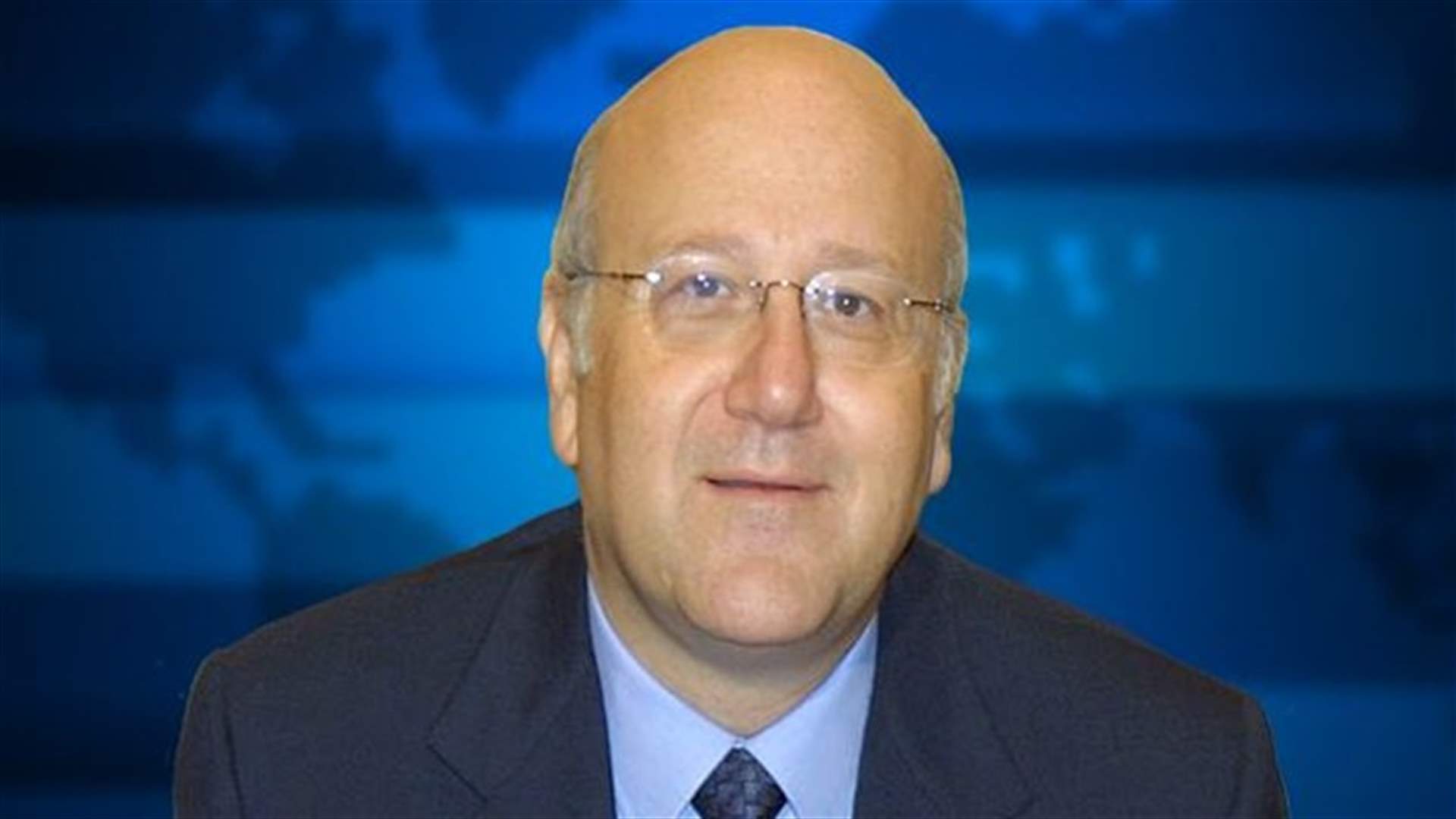 Caretaker PM Mikati says claims he delayed arrival of Indonesian boat victims are false