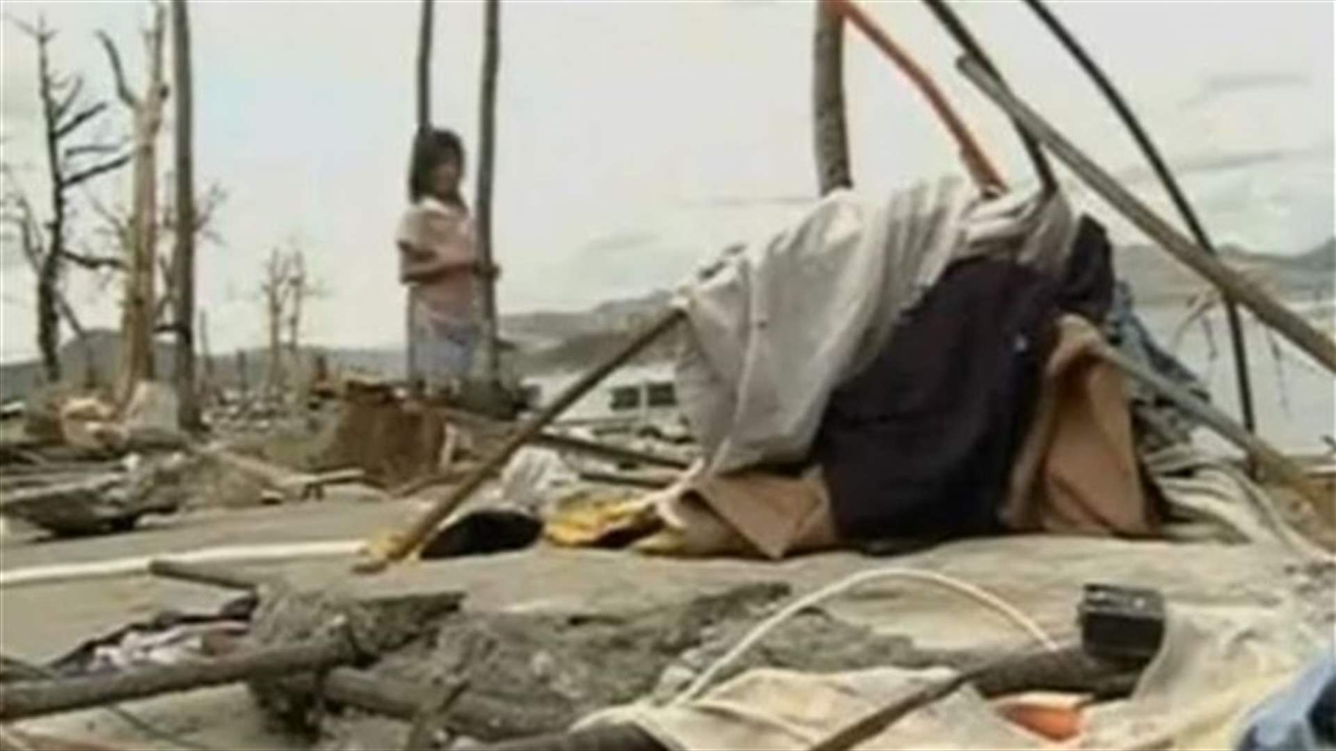REPORT: Desperate Philippine typhoon survivors loot, dig up water pipes