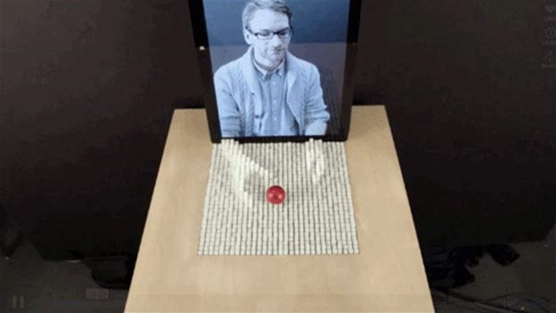 MIT invention allows you to interact with objects by reaching through your screen