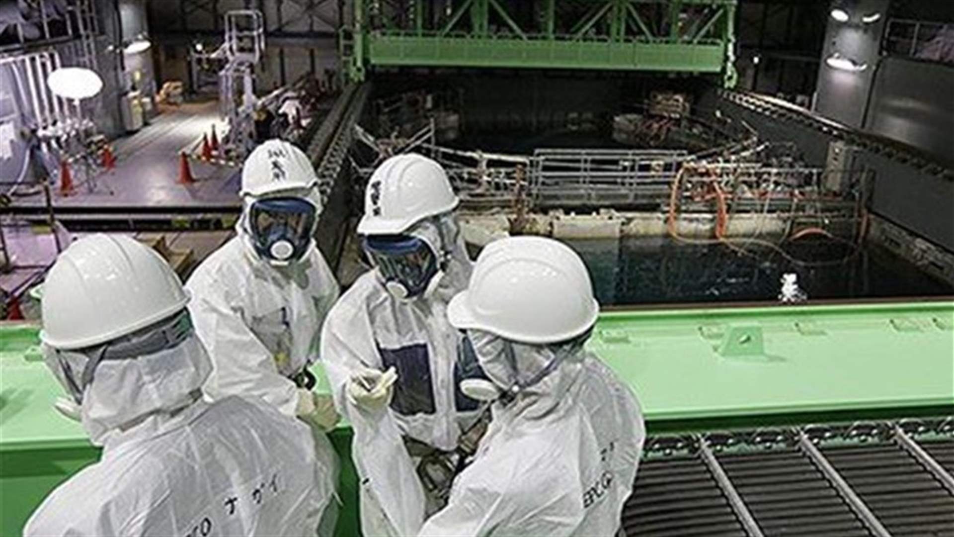 Damaged Japan nuke plant begin removing fuel rods