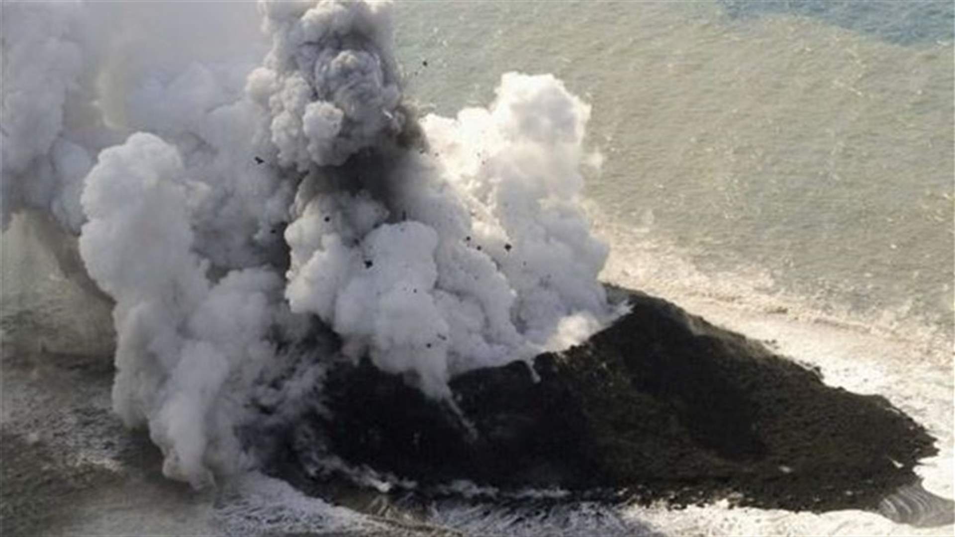 Volcano raises new island far south of Japan