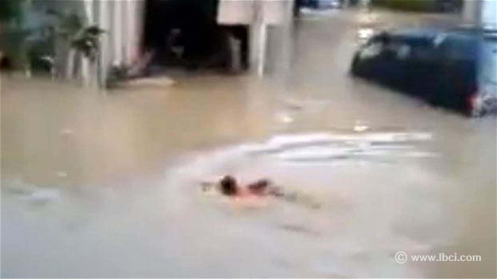 VIDEO: Child swims in Hay al-Sollom floods