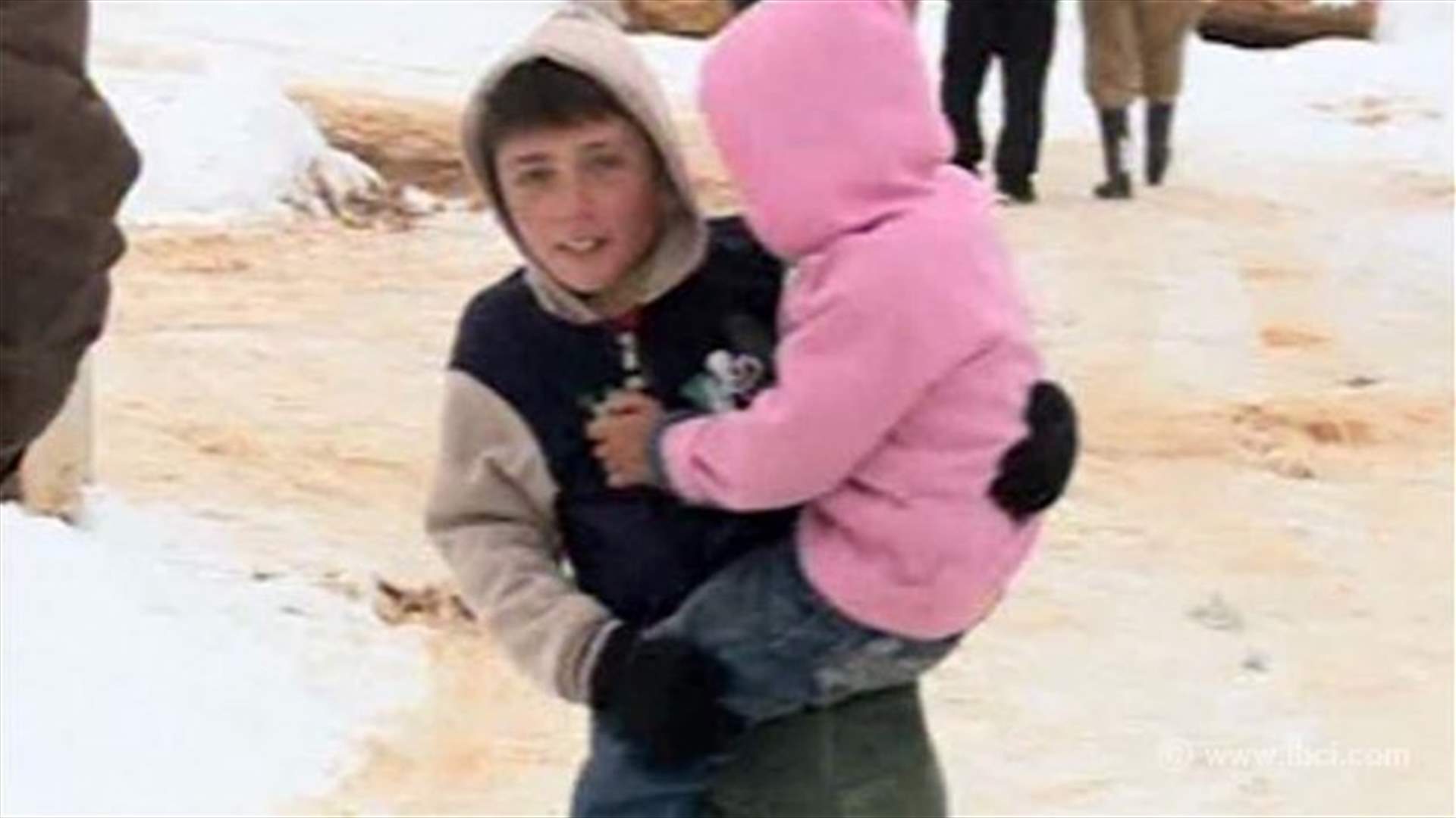 Syrian refugees in Lebanon bundle up against storm