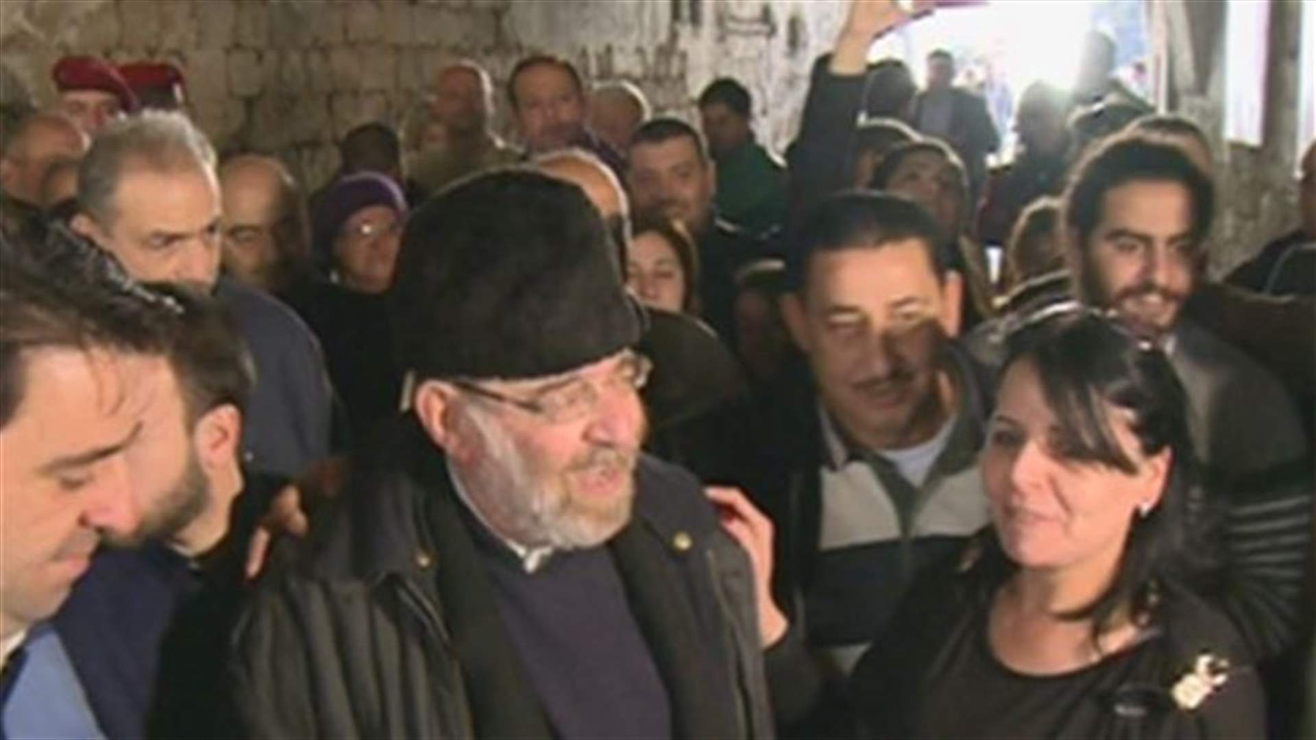 REPORT: Father Sarrouj returns to his burnt library