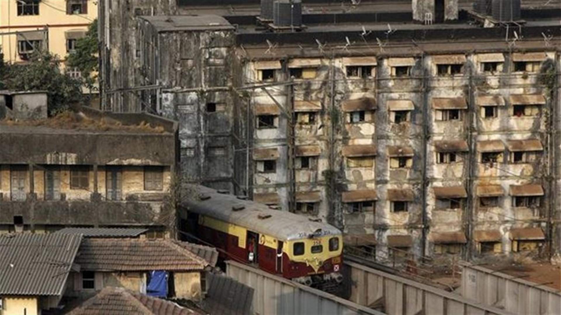 Indian train catches fire before dawn, killing 9
