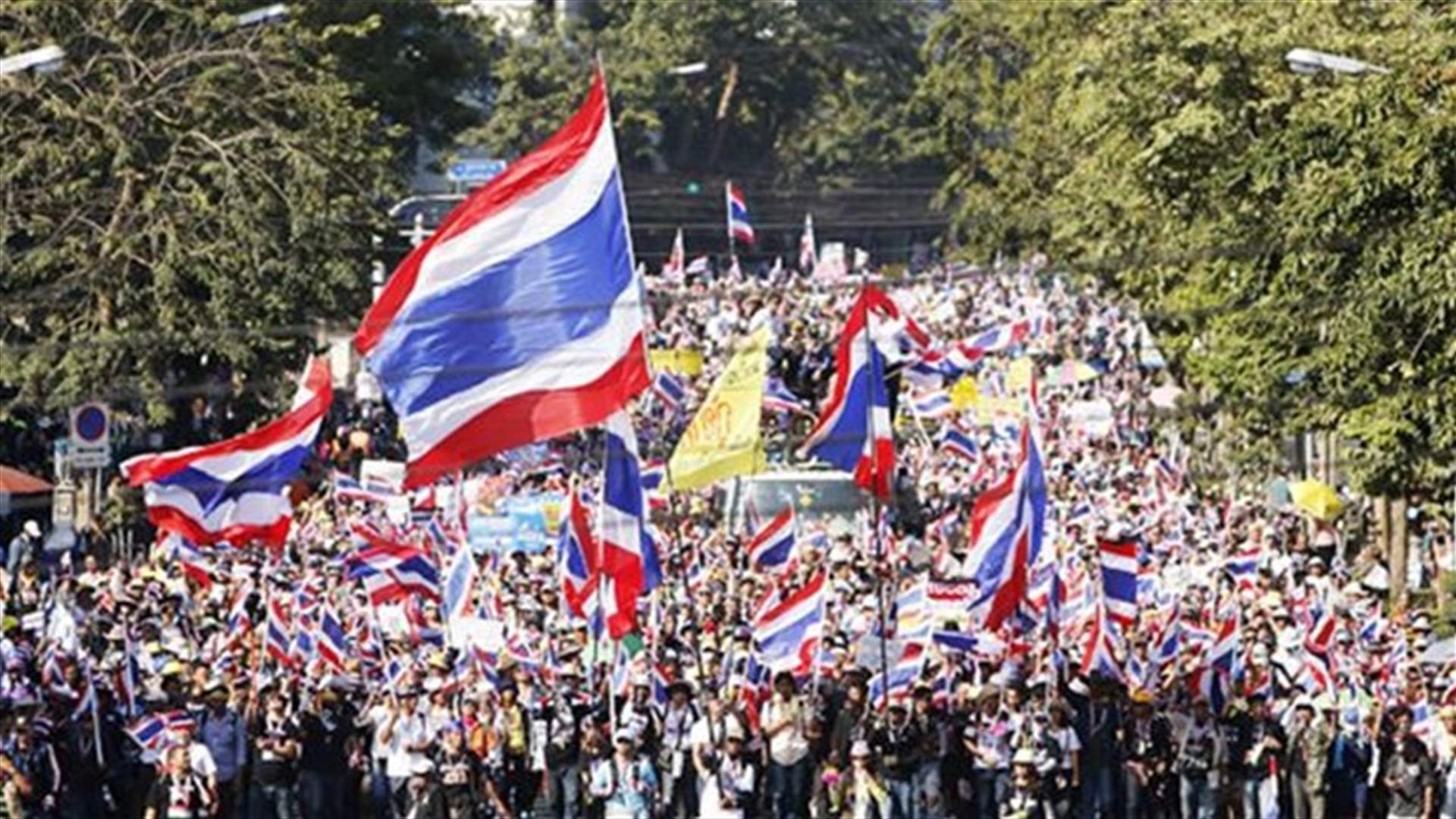 Thai protesters target ministries, threaten stock exchange