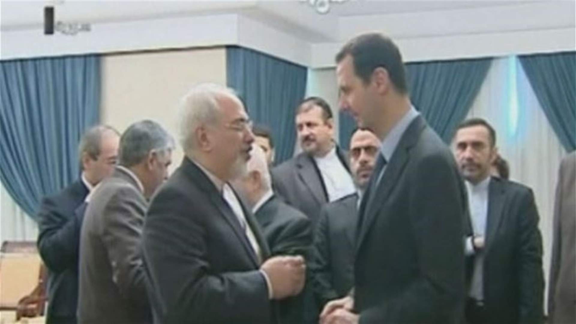 REPORT: Iran's FM discusses peace talks with Syria's Assad