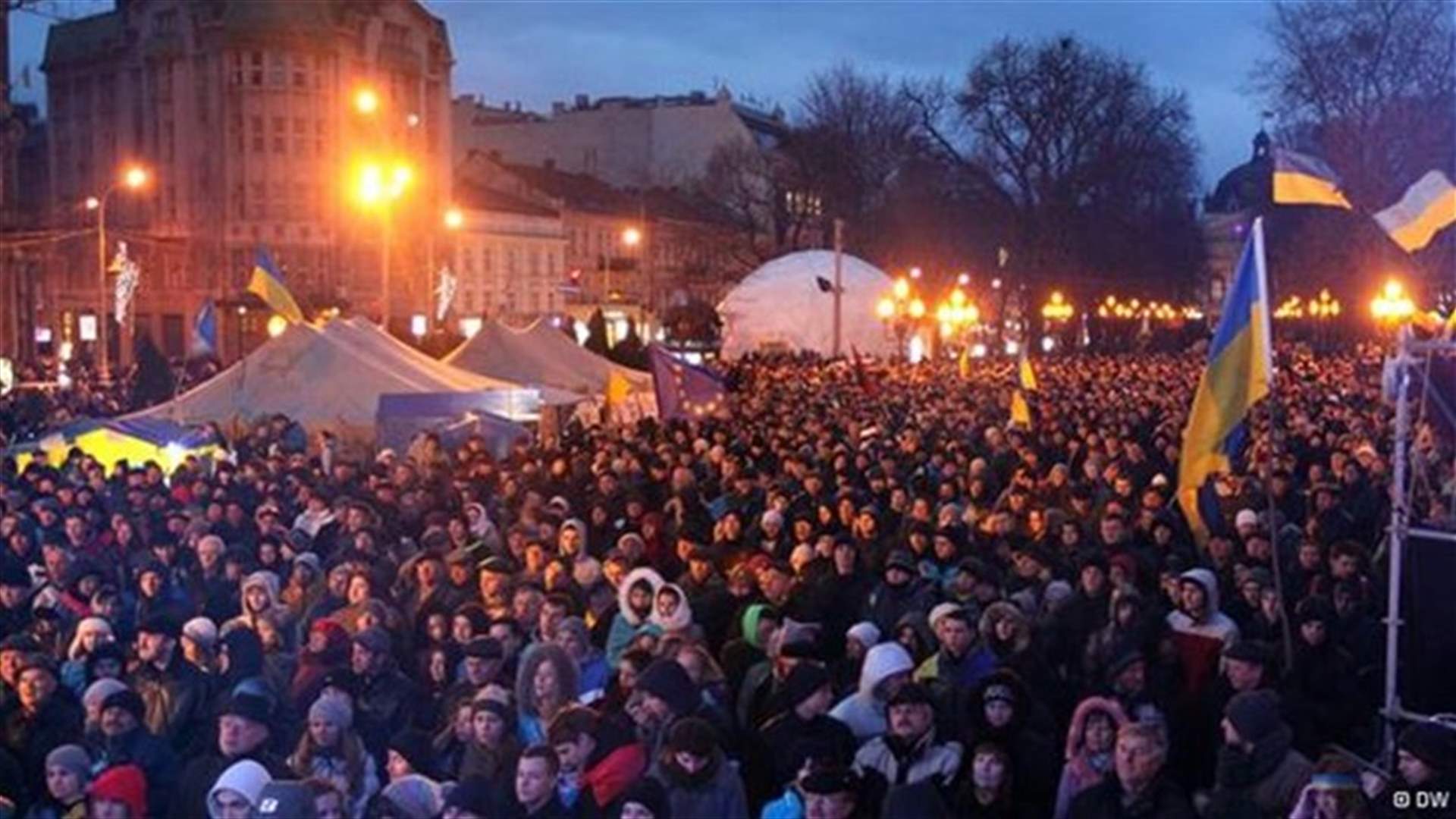 Police and protesters clash after Ukraine president offers foes posts