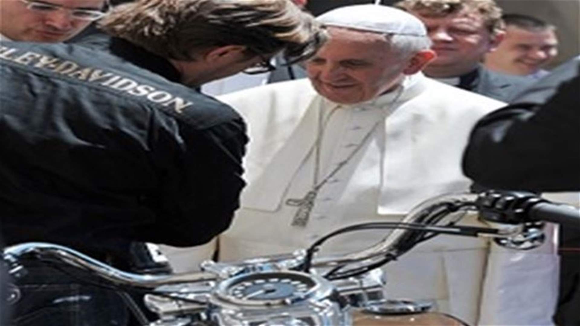 REPORT: Pope's Harley goes for $327,000 at charity auction 
