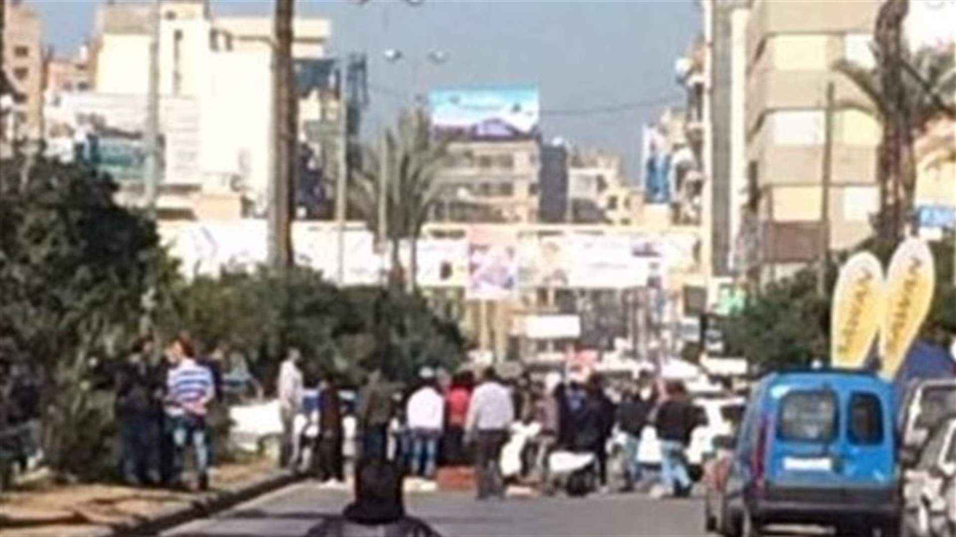 Residents block main road leading to al-Nour Square in Tripoli