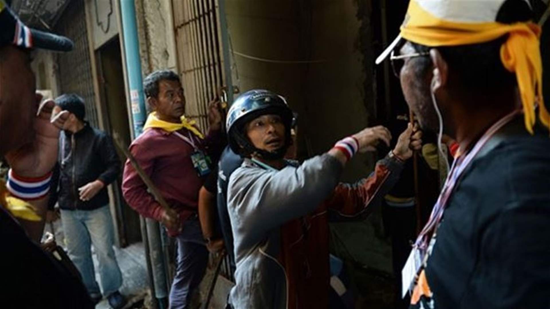 Blood on the streets as bomb kills two, wounds 22 in Thai capital