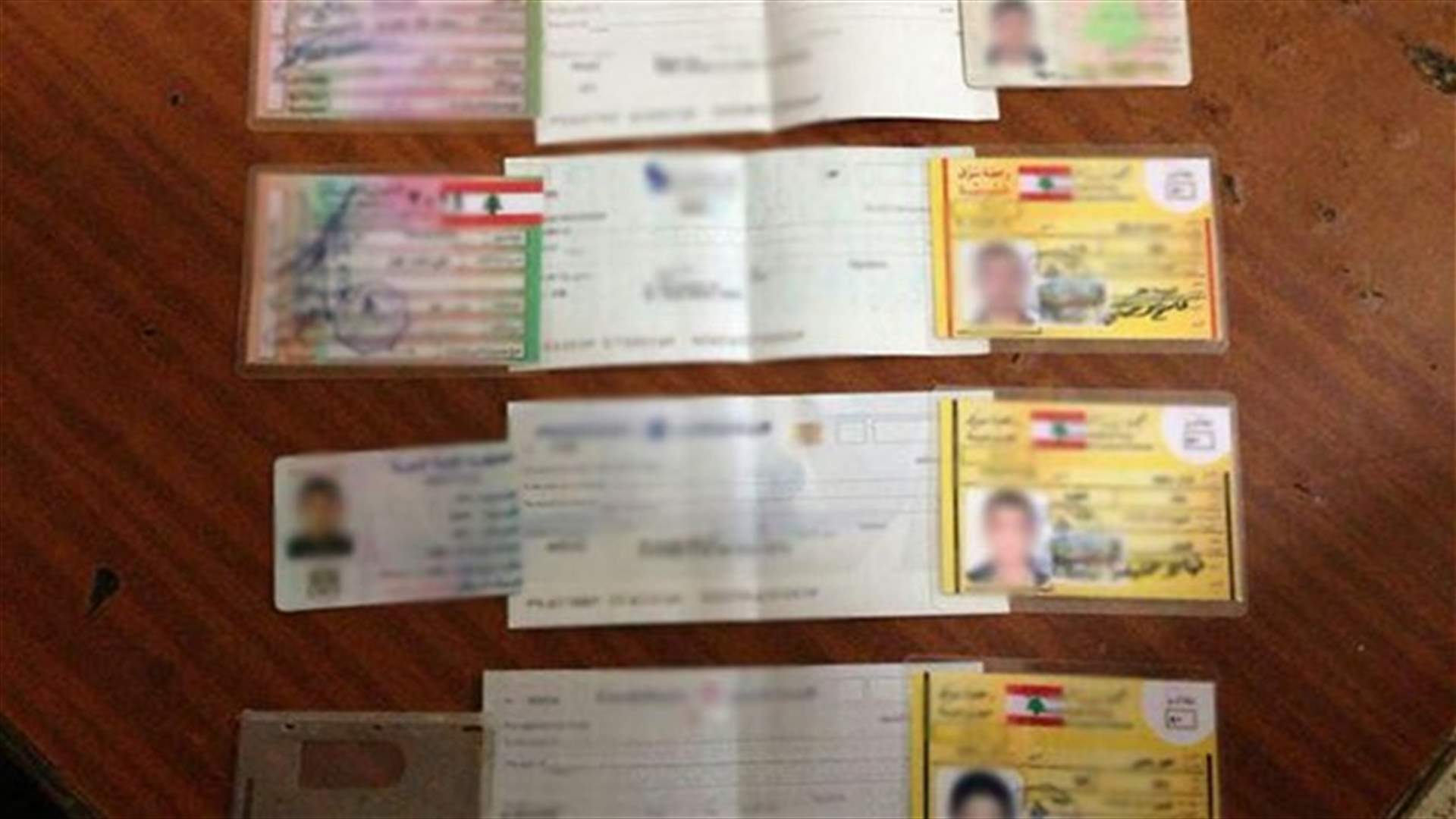 Security forces arrest person holding number of forged documents 