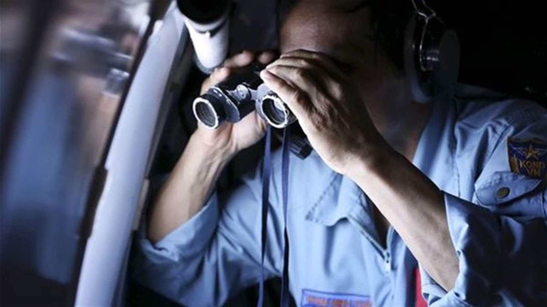 Malaysian police search home of missing plane's pilot - official