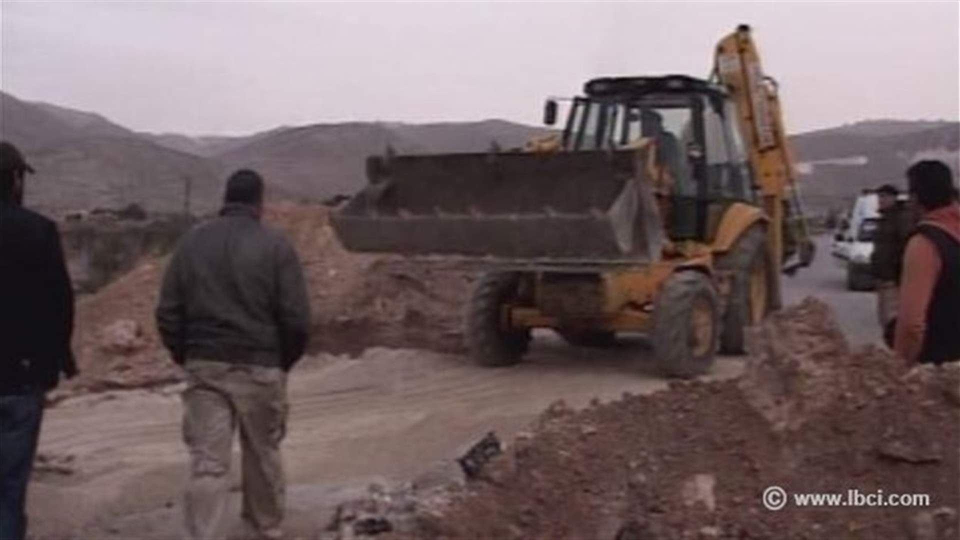 Bulldozers remove earthen berms, reopen Labweh-Arsal road