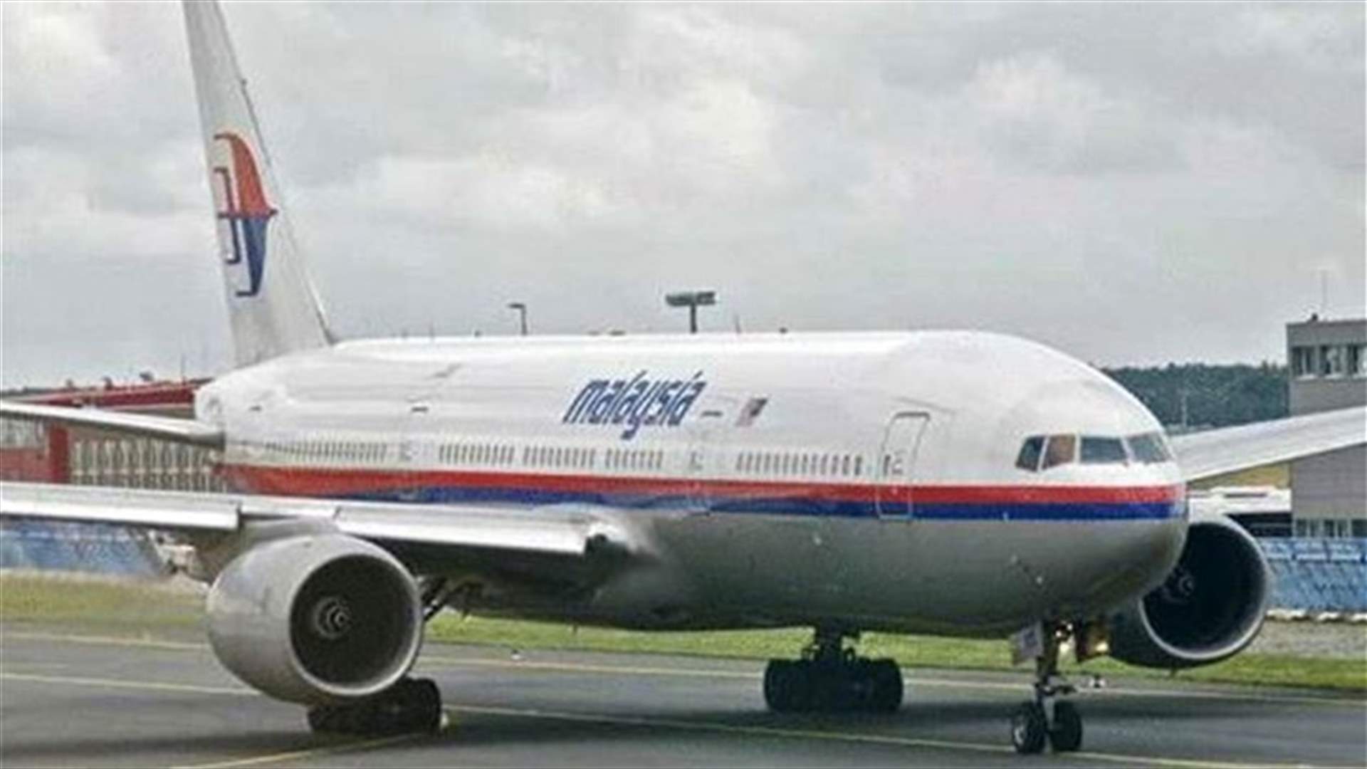 Malaysia flight's co-pilot tried to make cellphone call-report 